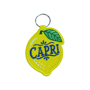 Porta-chaves bordado com design em formato de limão, inspirado na cidade de Capri, em Itália.