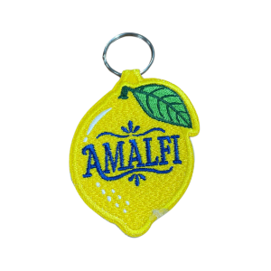 Porta-chaves bordado com design em formato de limão, inspirado na cidade de Positano, em Itália.